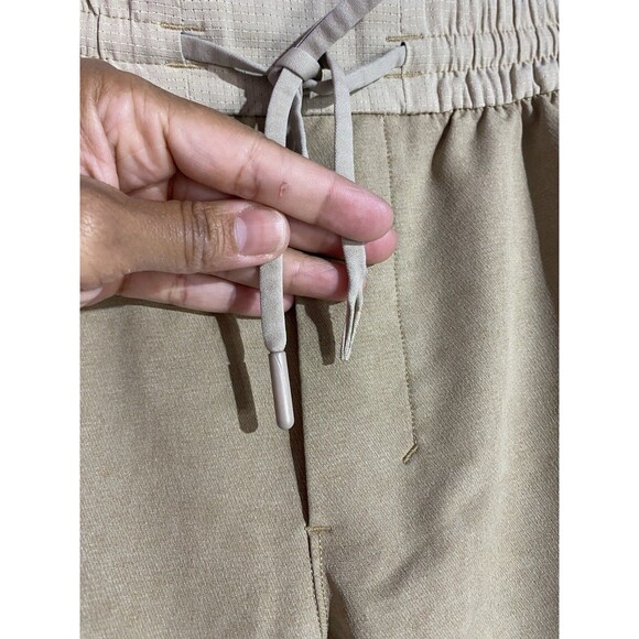 Lululemon License To Train Pant Mens S Tan Tapered Snap Hem Performance Preppy - Picture 5 of 15